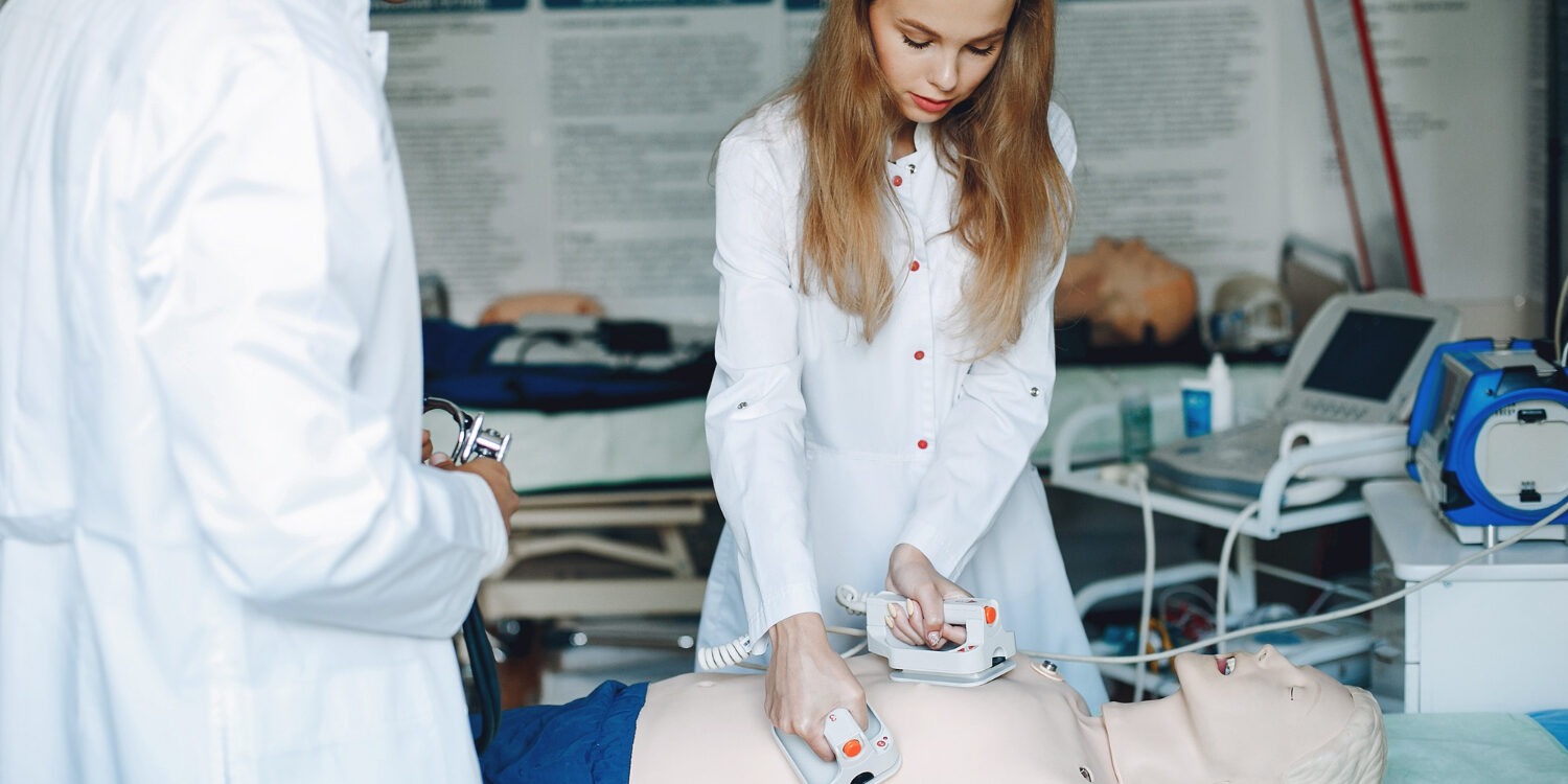 nurse-conducts-resuscitation-doctor-helps-woman-perform-operation-students-practice-medicine